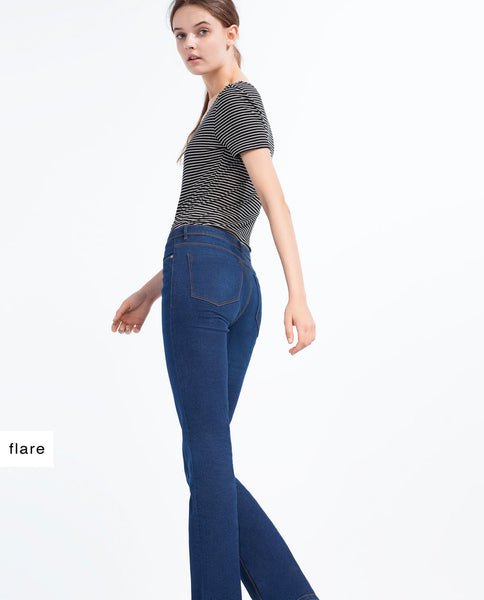 "ESSENTIAL FIT" FLARED SKINNY JEANS.